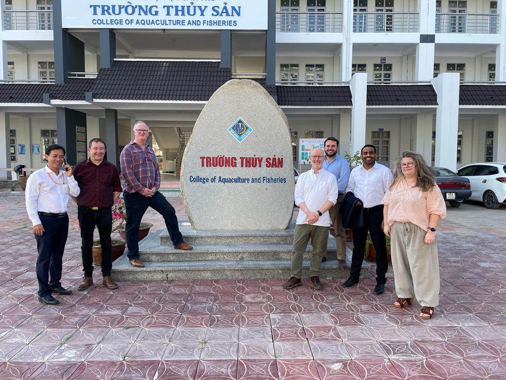 Colleagues from Bangor University and University of South Wales outside the Trường Thủy Sản College of Aquaculture and Fisheries