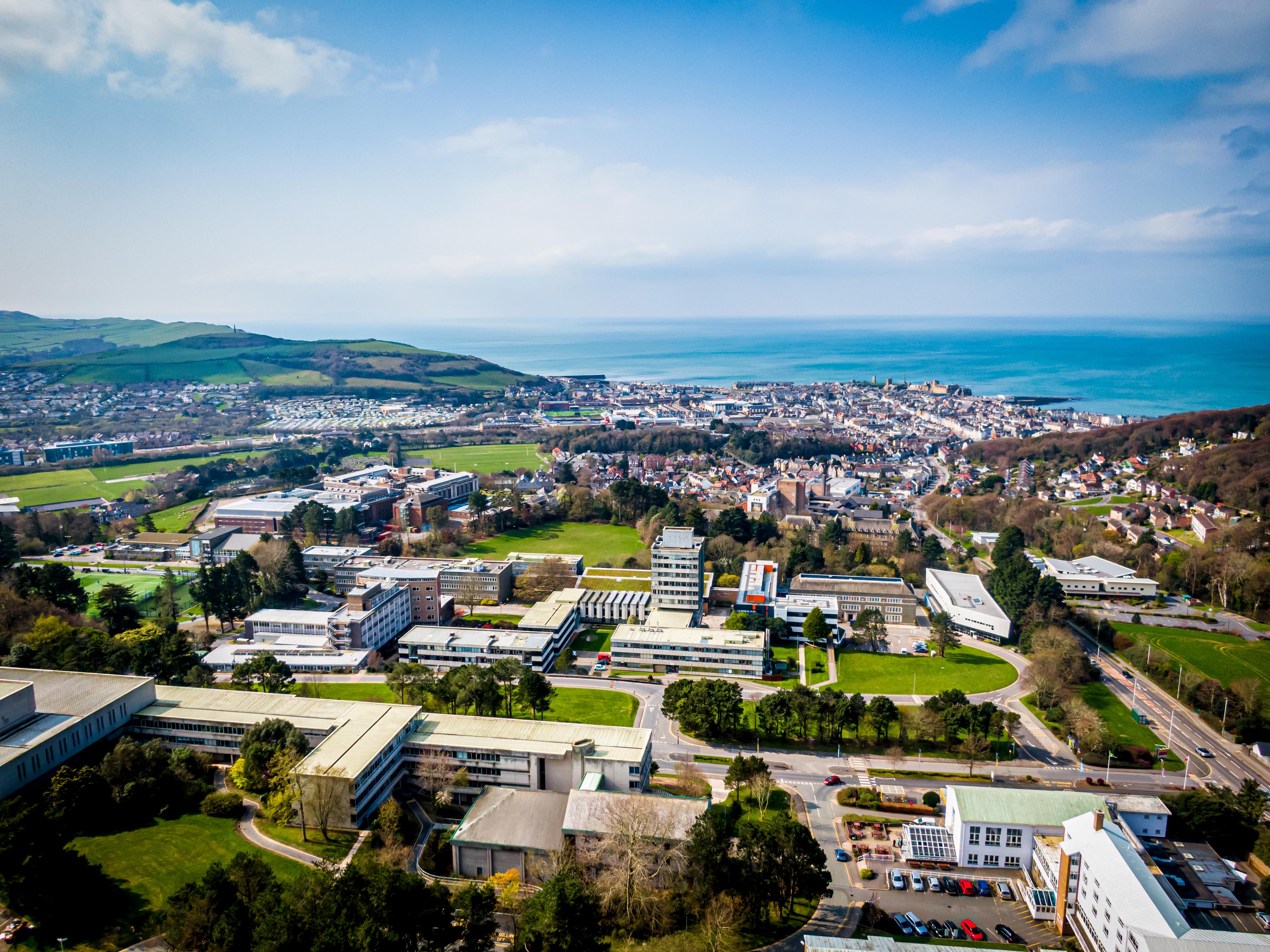 Aberystwyth University Campus from the air with the sea in the background