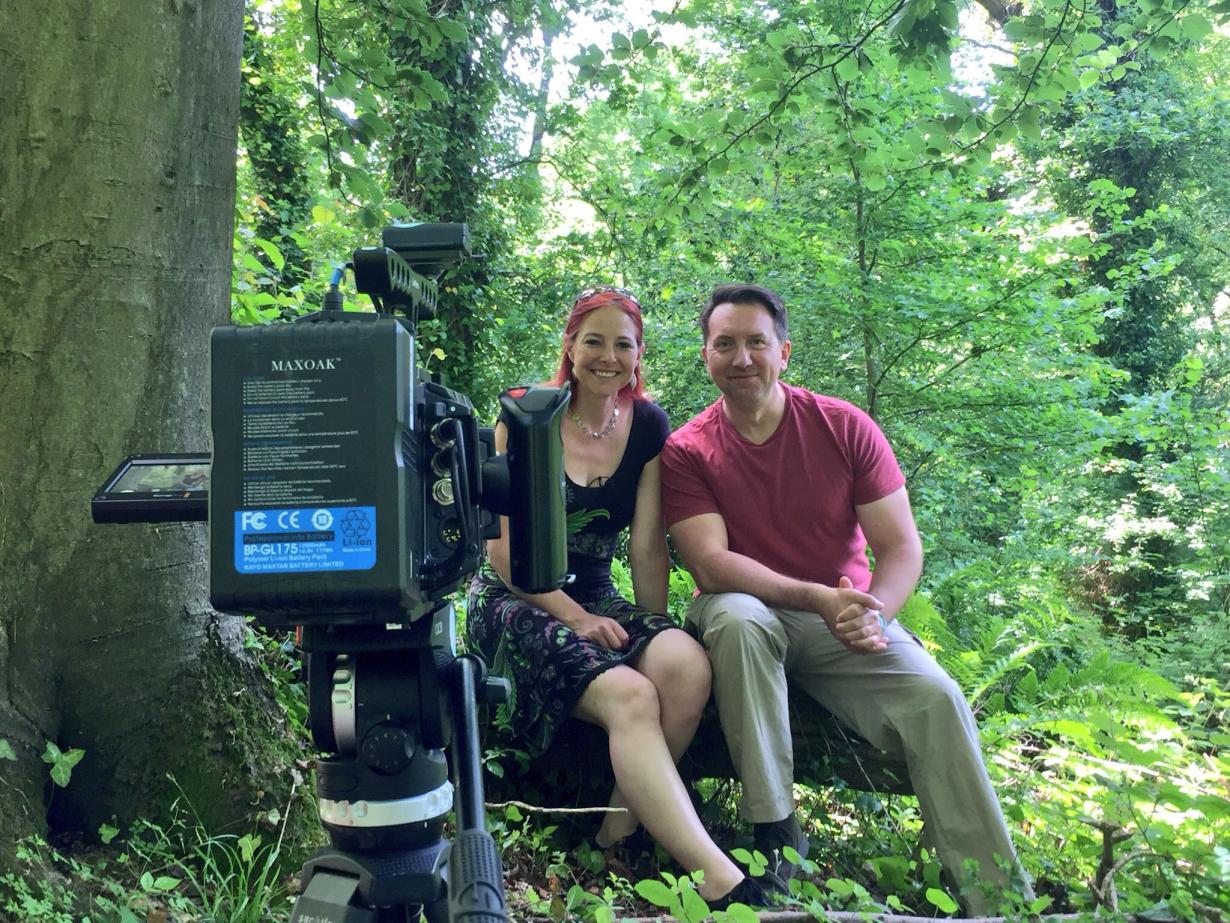 Rhys Jones and a female presenter filming in a forest
