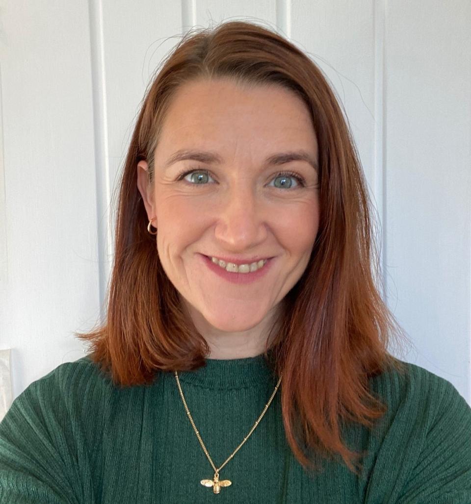 Photograph of Jodi Cox wearing a green top