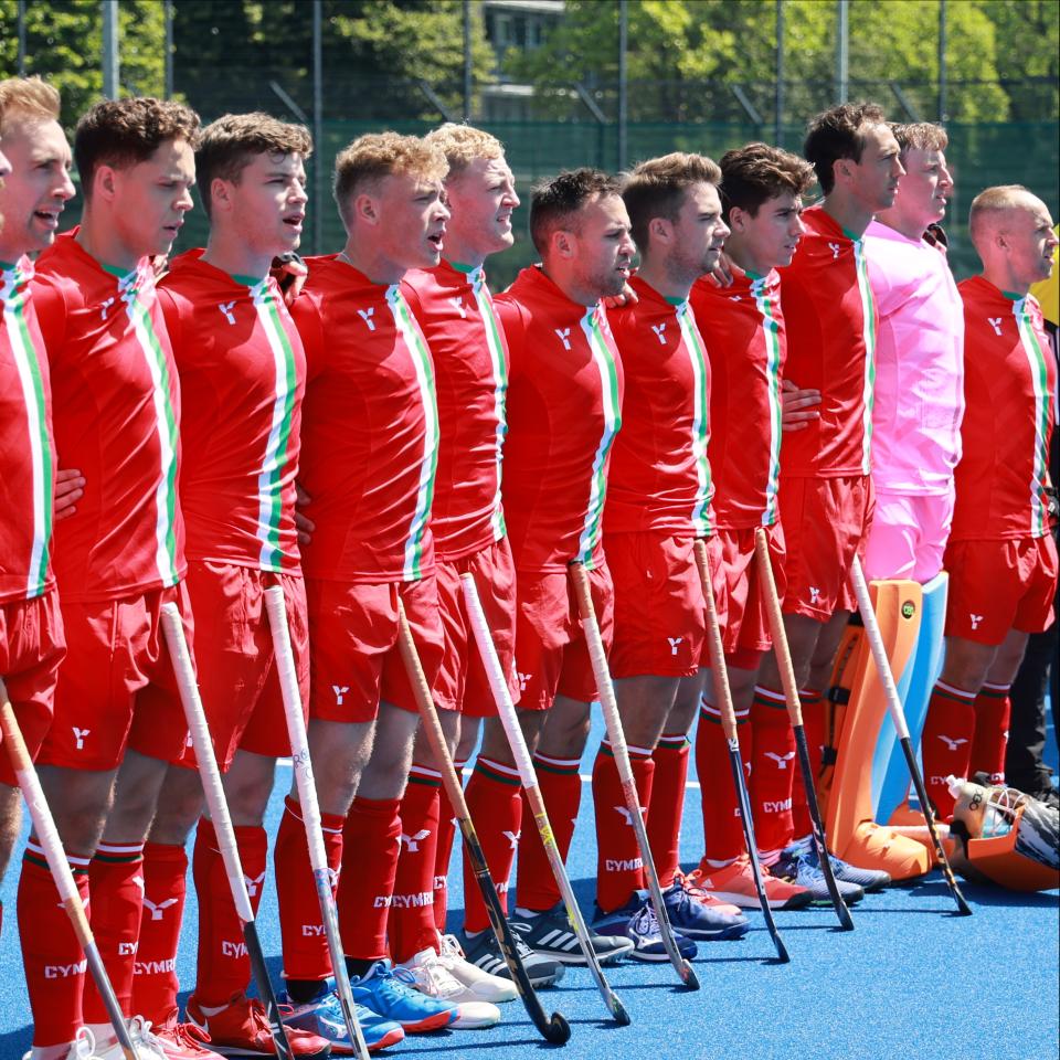 Wales men's hockey team lining up before a match. 