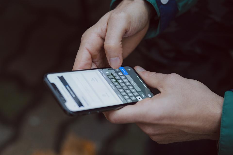 Close up of someone using a smart phone