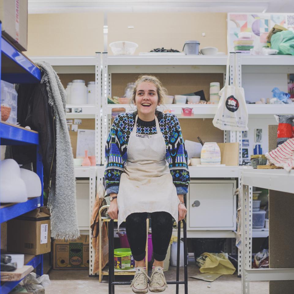 Photo of Charlotte Manser in a workshop