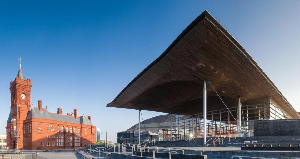 Senedd and Pierhead building against a blue sky