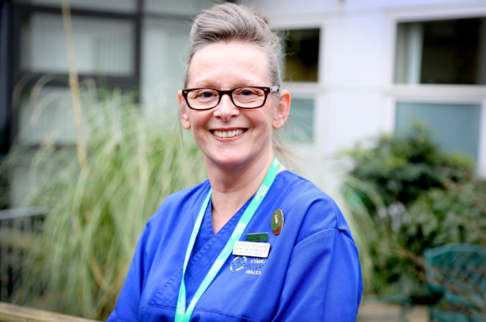 Photo of Sharon Manning wearing nursing scrubs