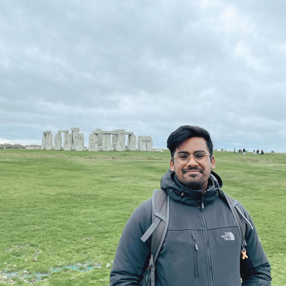 Keshlan standing in front of Stonehenge