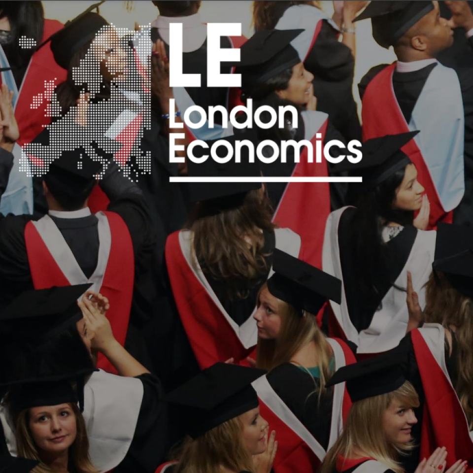 A crowd of people in graduation robes with a white London Economics logo over the top