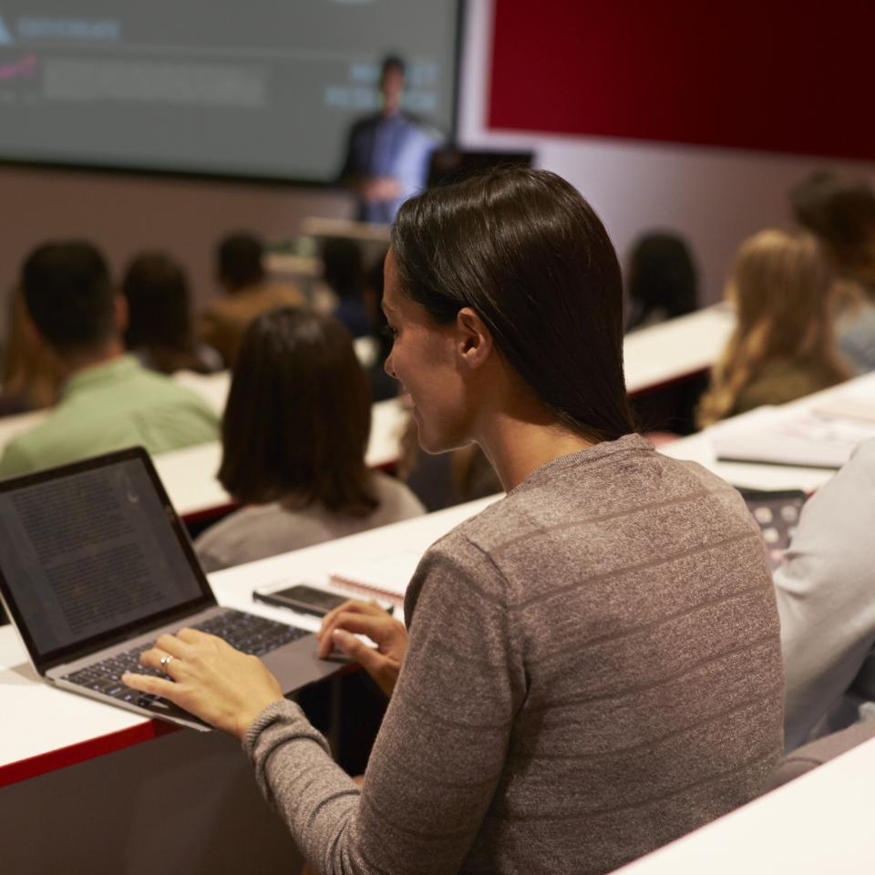 Students sitting in a lecture theatre