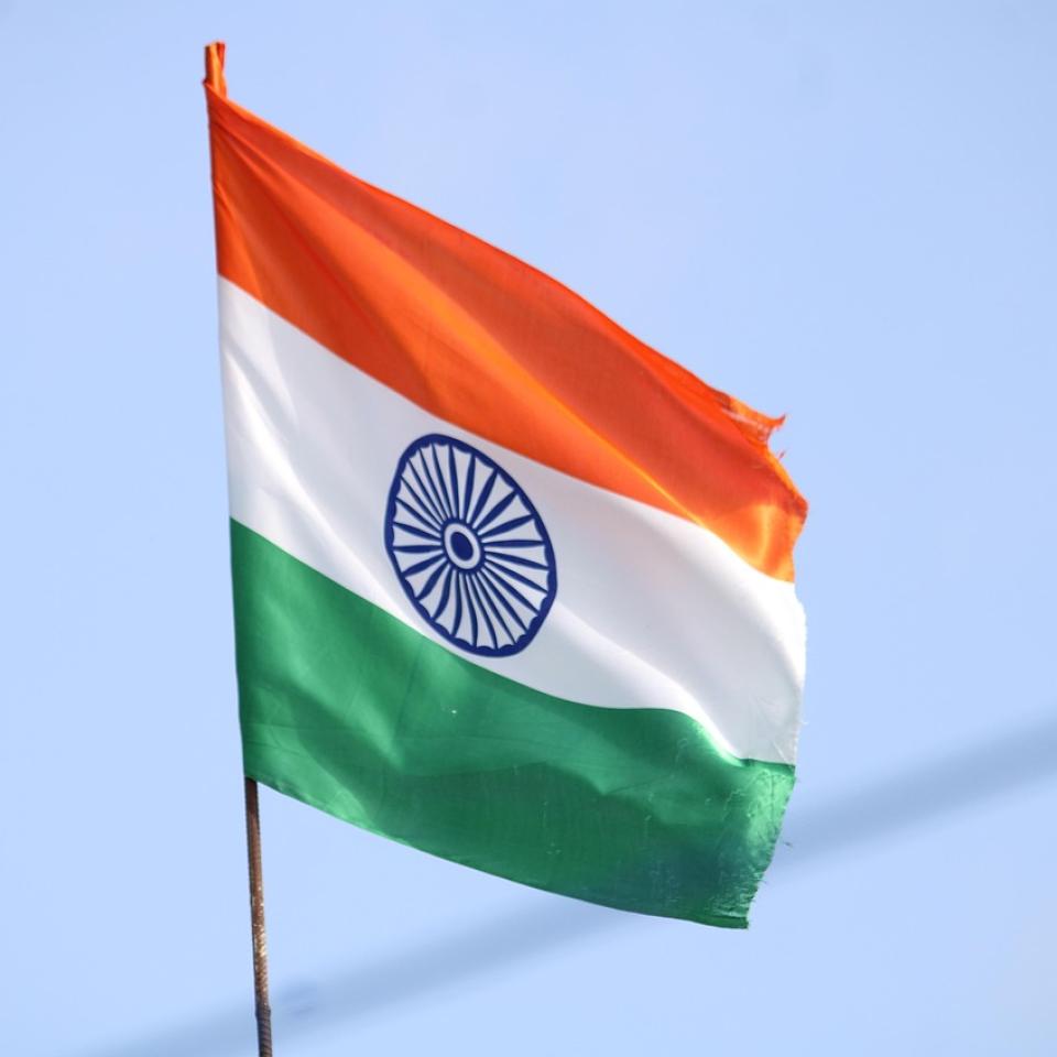 India flag against a blue sky