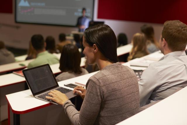 Students sitting in a lecture theatre