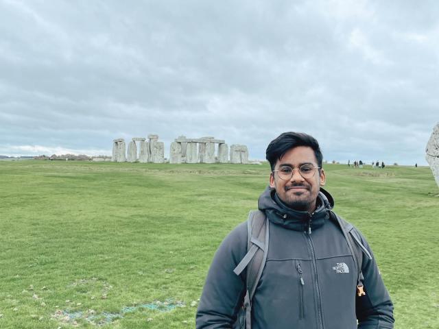 Keshlan standing in front of Stonehenge