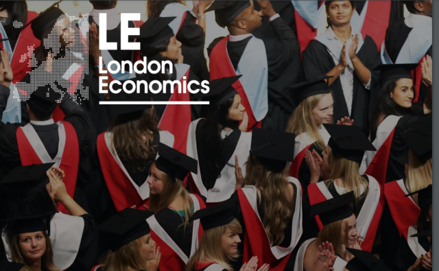 A group of smiling people dressed in graduation caps and gowns