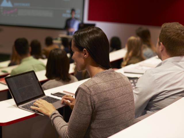 Students sitting in a lecture theatre